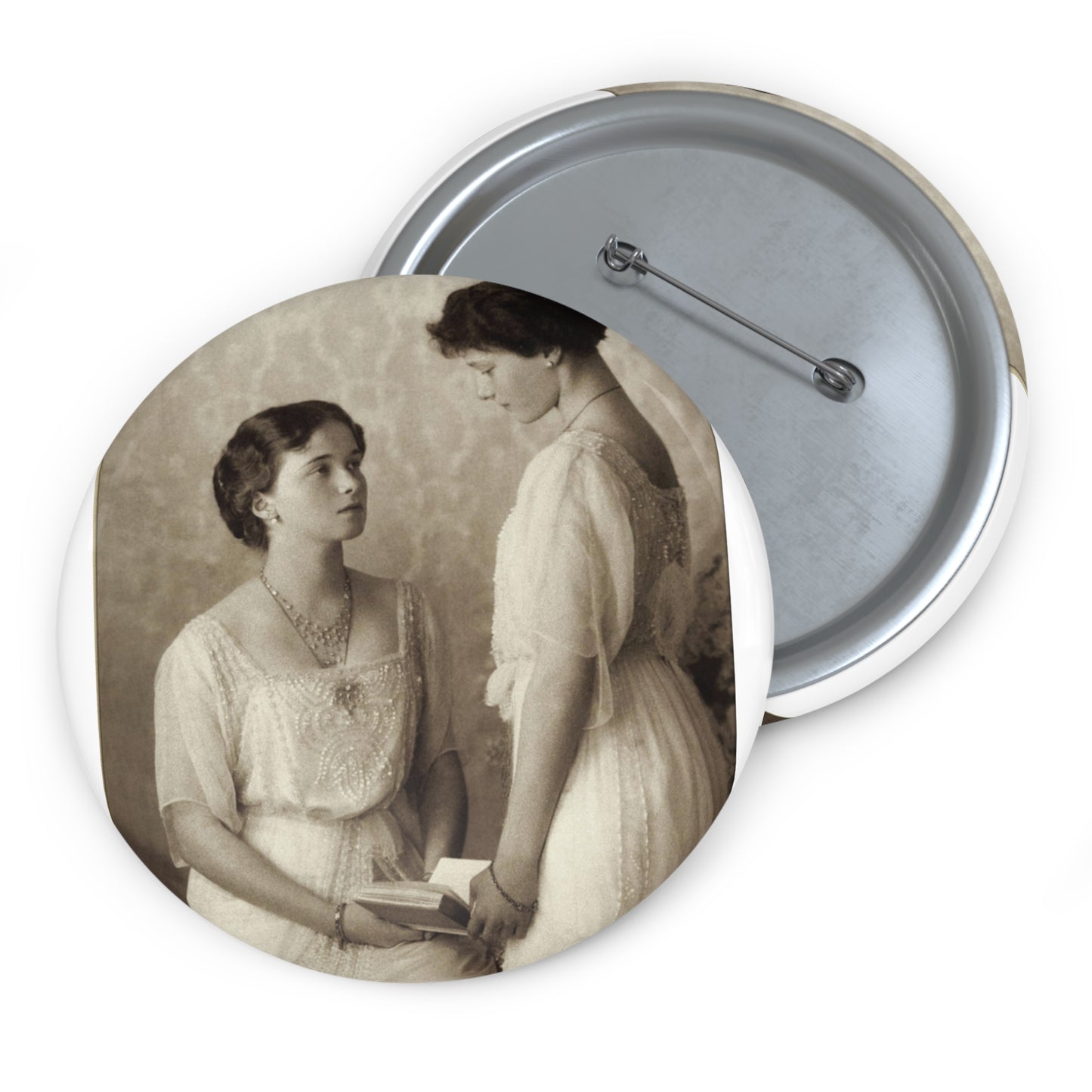 Grand Duchesses Olga and Tatiana. 1913. Pin Buttons with Crisp Design