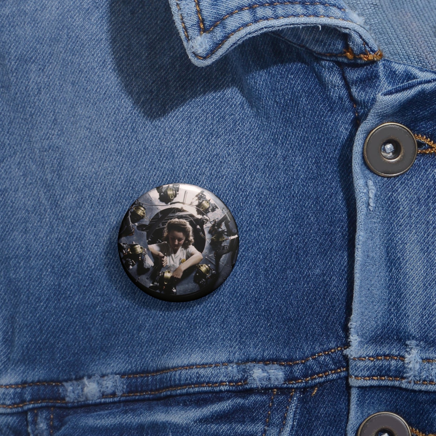 Part of the cowling for one of the motors for a B-25 bomber is assembled in the engine department of North American [Aviation, Inc.]'s Inglewood, Calif., plant Pin Buttons with Crisp Design