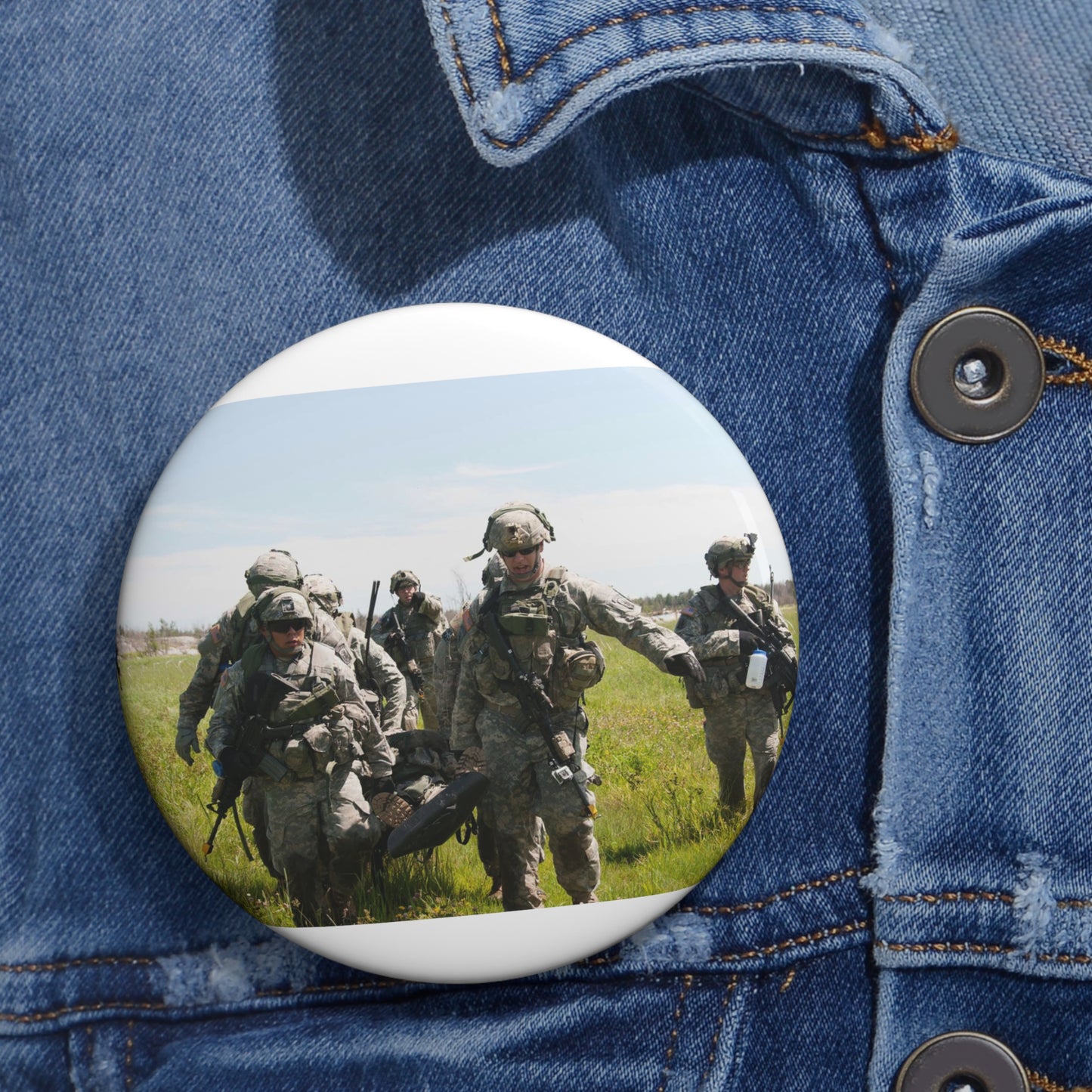 U.S. Army Sgt. Sean Fernandes (right), team leader, Pin Buttons with Crisp Design