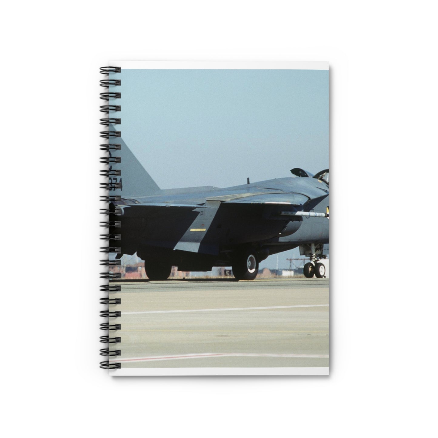 An F-111 from the 523rd Fighter Squadron, 27th Fighter Wing, Cannon Air Force Base, New Mexico taxis out to the runway Spiral Bound Ruled Notebook with Printed Cover