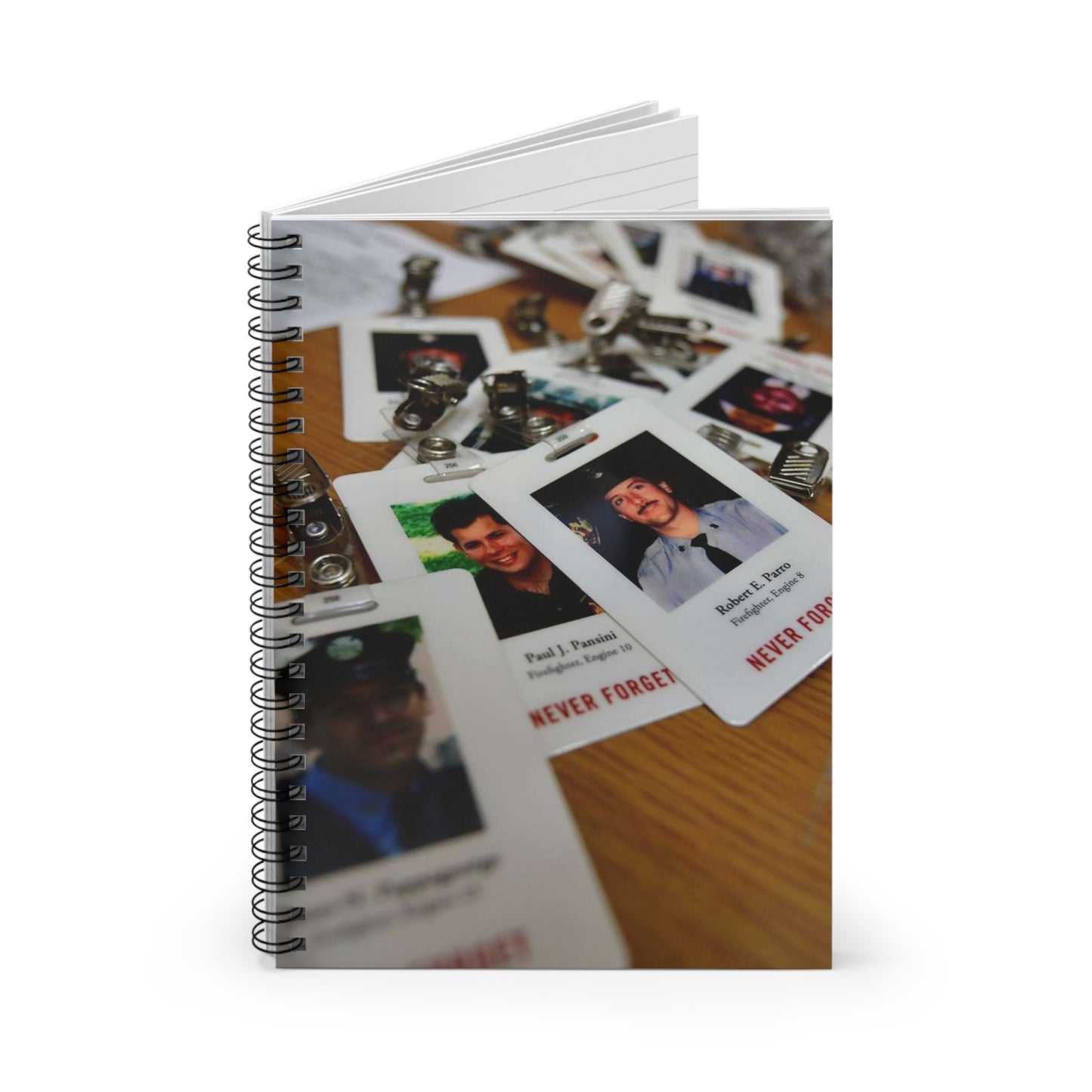 Badges with photos of 9/11 emergency responders, sit Spiral Bound Ruled Notebook with Printed Cover