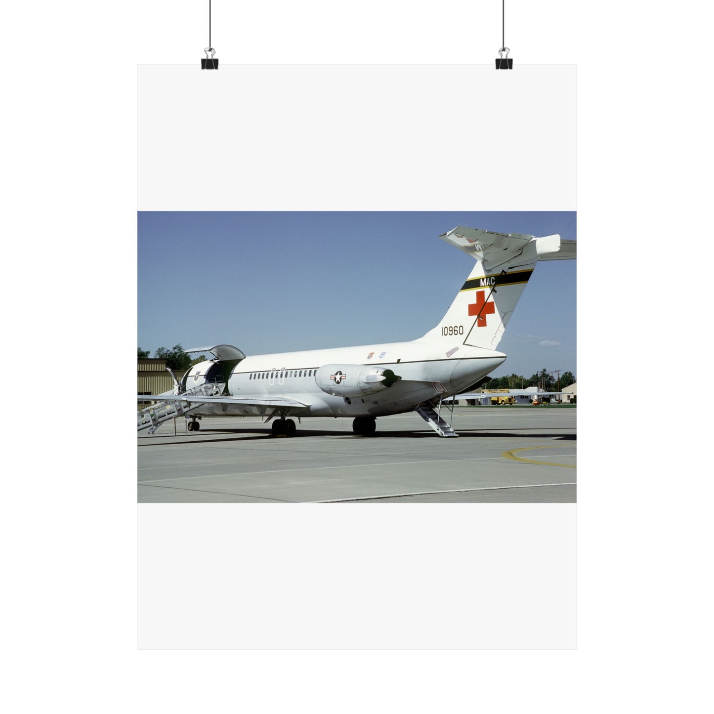 A left rear view of a 375th Aeromedical Airlift Wing a C-9 Nightingale aircraft on the flight line with staircase and loading ramp inposition High Quality Matte Wall Art Poster for Home, Office, Classroom