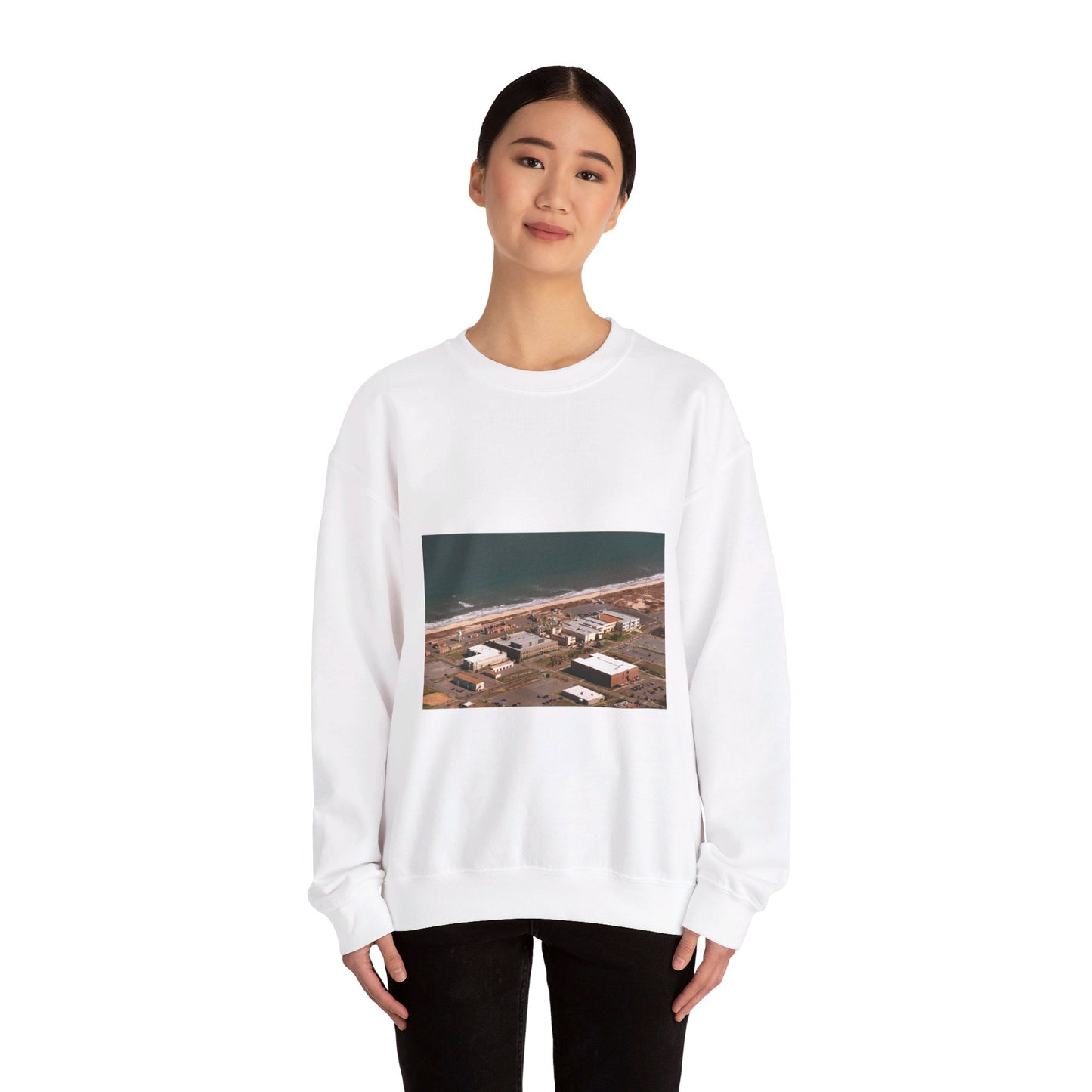 An aerial view of the Naval Surface Warfare Center testing building on the Dam Neck Naval Base. Along the beach are various types of gun mounts with their associated fire control radars atop the test building White Heavy Blend Adult Crew Neck SweatShirt