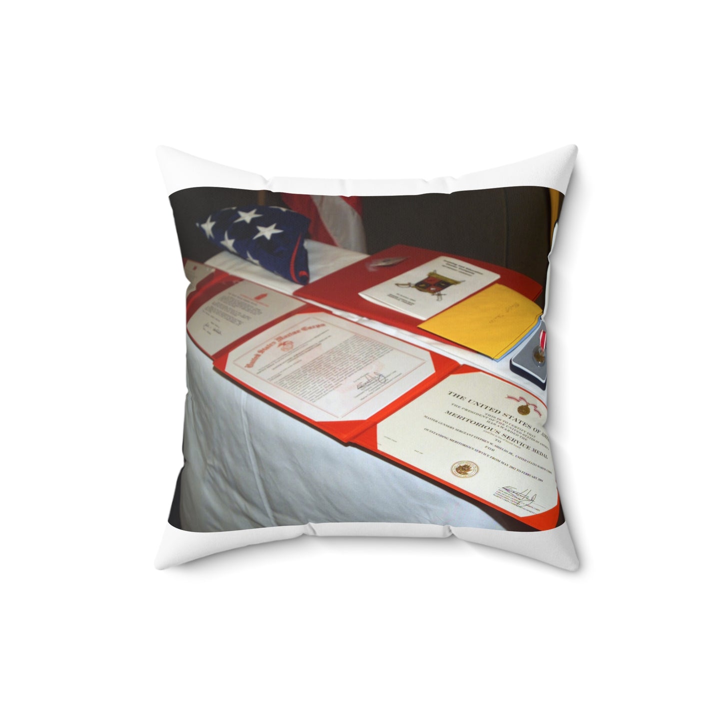 A display of US Marine Corps (USMC) MASTER GUNNERY Sergeant (MGYSGT) Stephen W. Shields' awards lay on a table during his retirement ceremony, at the Clubs of Quantico, Marine Corps Base (MCB) Quantico, Virginia Decorative Accent Square Pillow