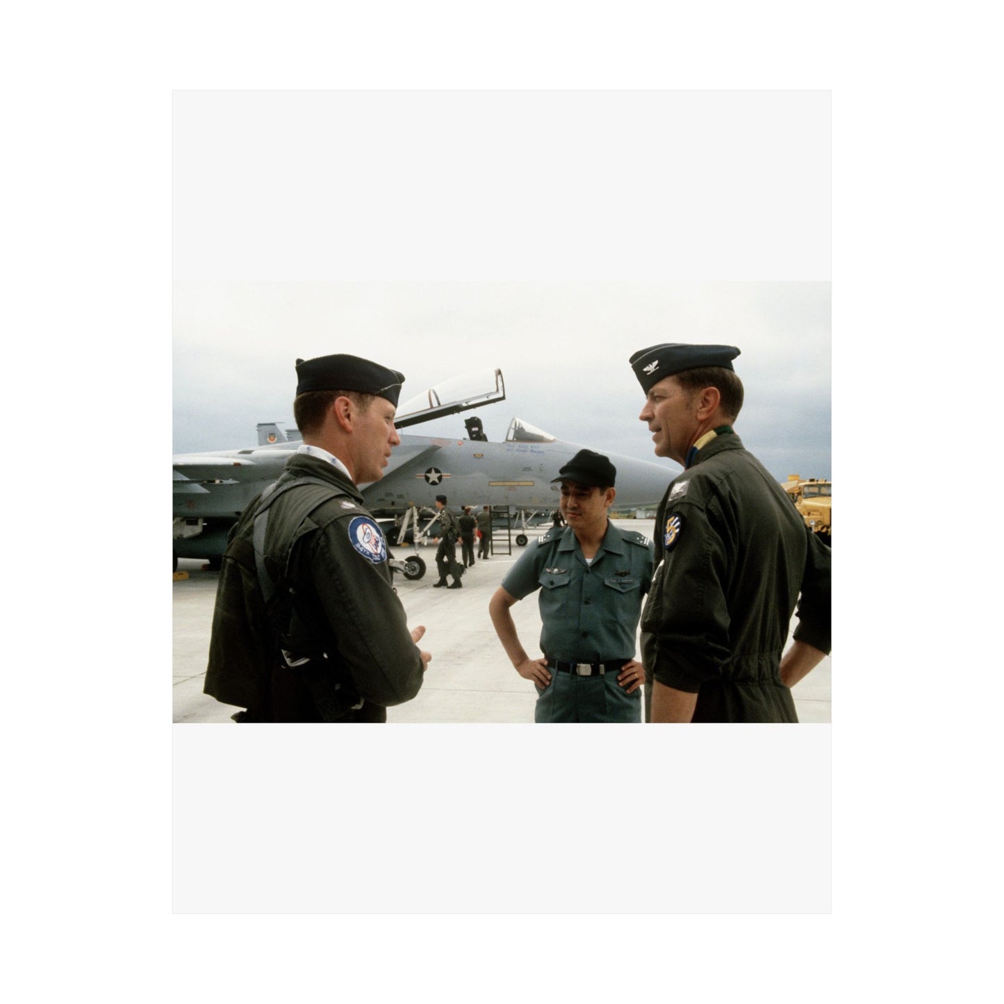 Upon his arrival, LTC Tom Barber (left), is greeted by Exercise Cope North '81-3 directors, COL George Peacock and Japanese Air SelF Defense Force COL V. Nomura High Quality Matte Wall Art Poster for Home, Office, Classroom