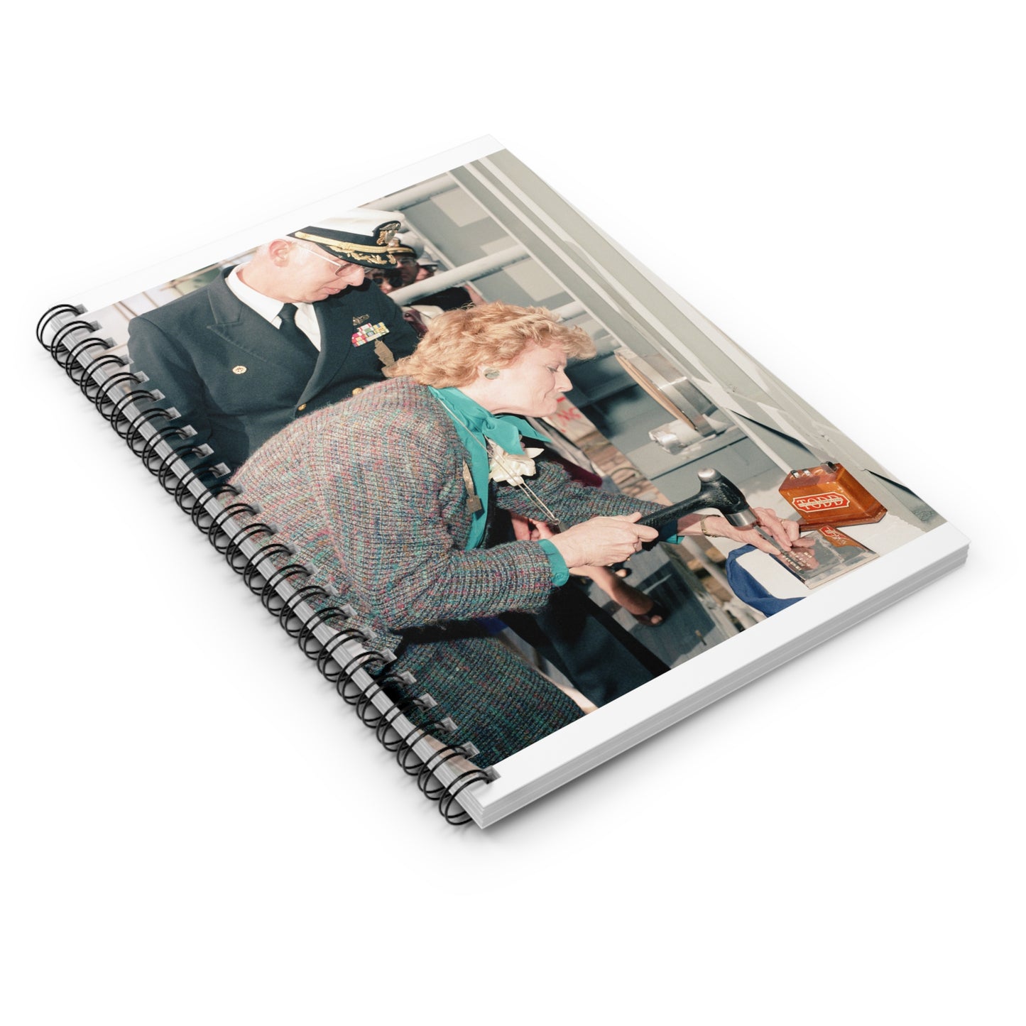 Mrs. E. Meese and Captain (CAPT) R.H. Randall, supervisor of Shipbuilding, Conversion, and Repair, participate in the keel laying of the guided missile frigate Rodney M. Davis (FFG 60) Spiral Bound Ruled Notebook with Printed Cover