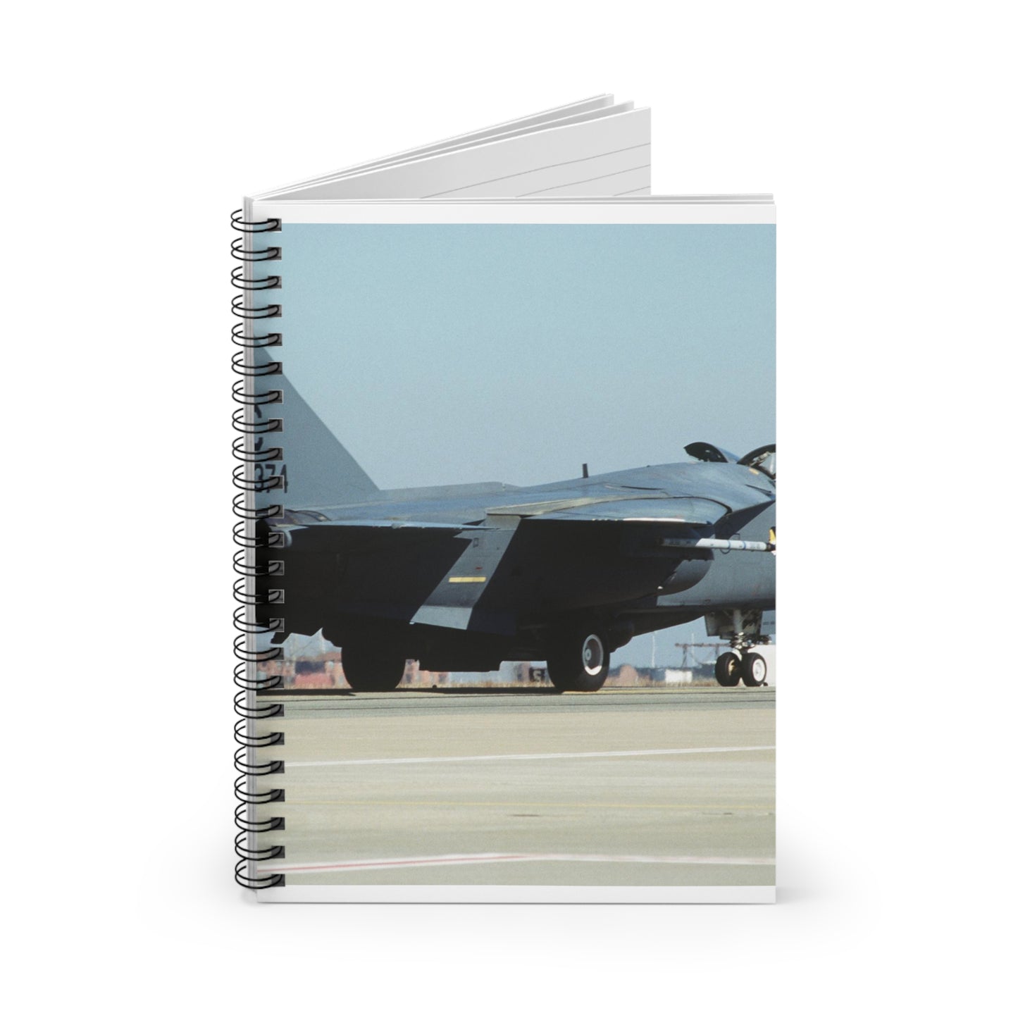 An F-111 from the 523rd Fighter Squadron, 27th Fighter Wing, Cannon Air Force Base, New Mexico taxis out to the runway Spiral Bound Ruled Notebook with Printed Cover