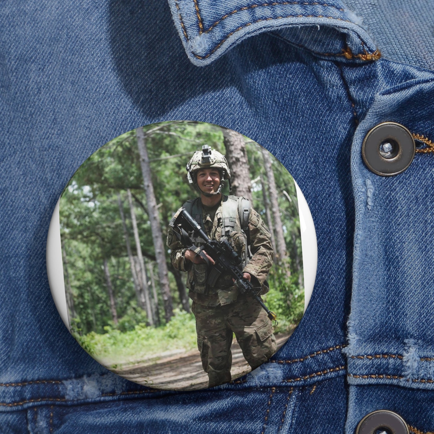 1st Lt. Jamieson Barnes an officer with Headquarters, Pin Buttons with Crisp Design