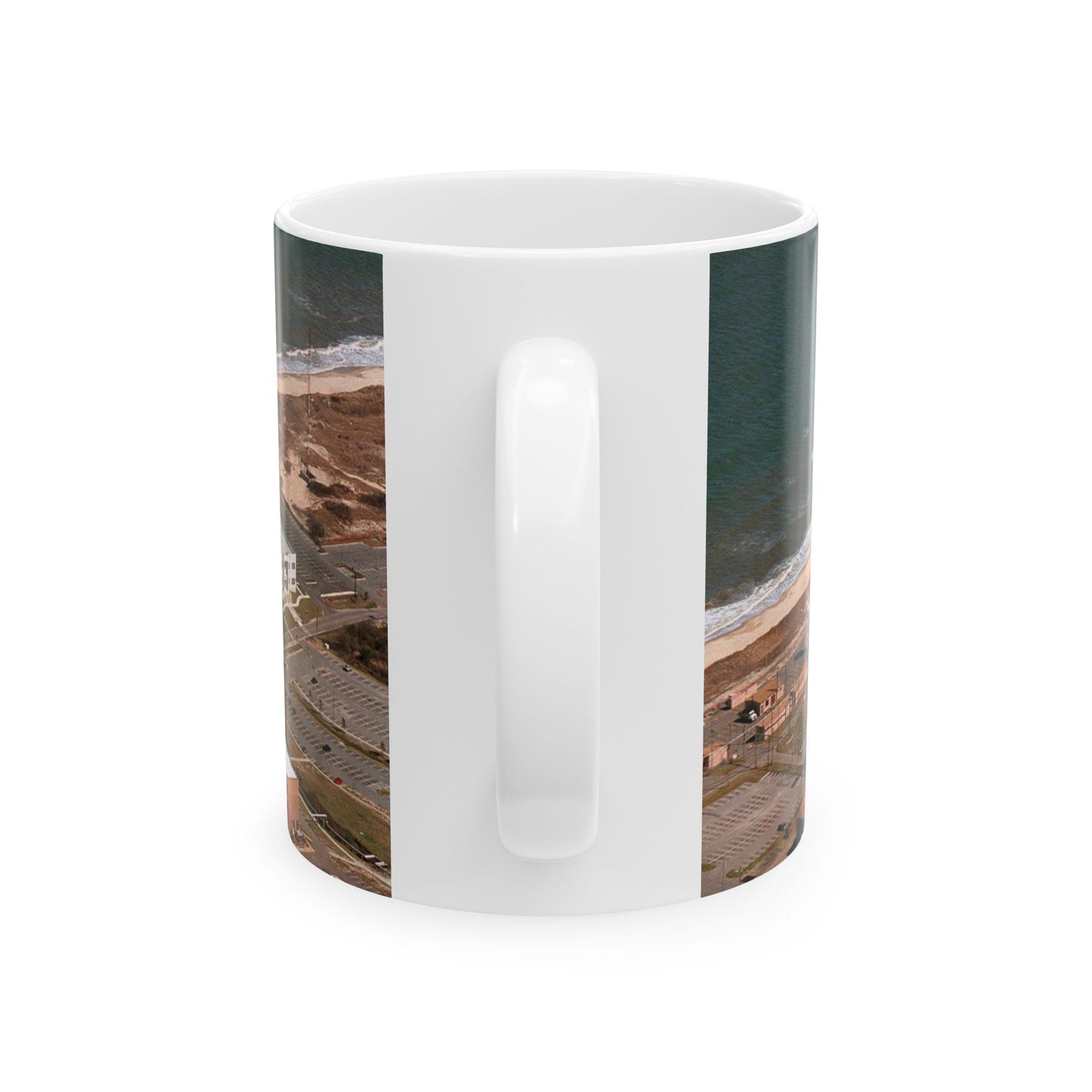 An aerial view of the Naval Surface Warfare Center testing building on the Dam Neck Naval Base. Along the beach are various types of gun mounts with their associated fire control radars atop the test building Beautiful Novelty Ceramic Coffee Mug 11oz