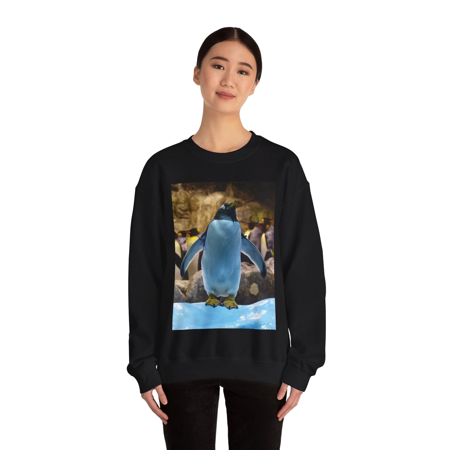 A penguin standing on top of an ice floer. Donkey penguin penguin attention. Black Heavy Blend Adult Crew Neck SweatShirt