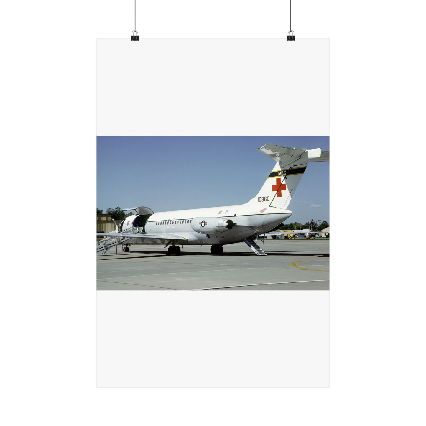 A left rear view of a 375th Aeromedical Airlift Wing a C-9 Nightingale aircraft on the flight line with staircase and loading ramp inposition High Quality Matte Wall Art Poster for Home, Office, Classroom