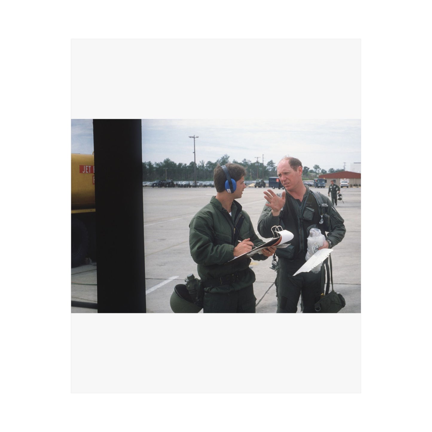 Colonel Tom Barber (right), director of operations, 33rd Tactical Fighter Wing (33rd TFW) is debriefed by First Lieutenant Robert M. Haire (left), intelligence officer, 33rd TFW High Quality Matte Wall Art Poster for Home, Office, Classroom