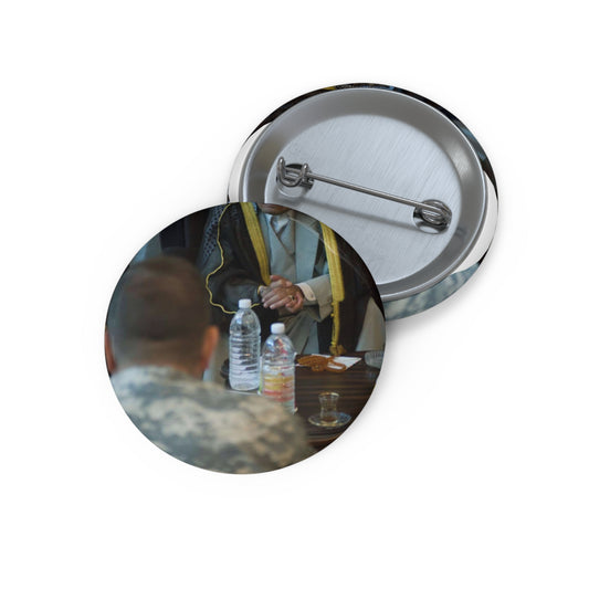 Sheik Mohammed al-Jorani listens to Col. Peter Baker, Pin Buttons with Crisp Design