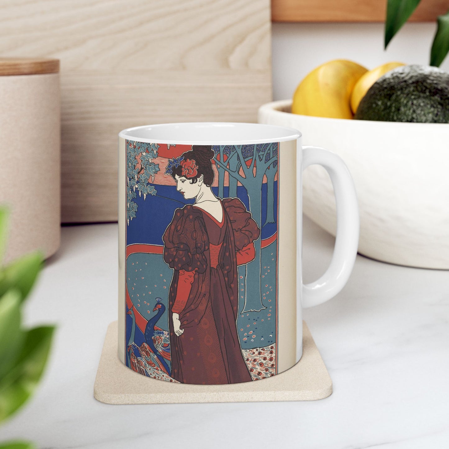 Louis Rhead - A woman stands looking at two peacocks. Beautiful Novelty Ceramic Coffee Mug 11oz